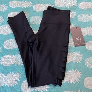 NWT 90 degree slit leggings